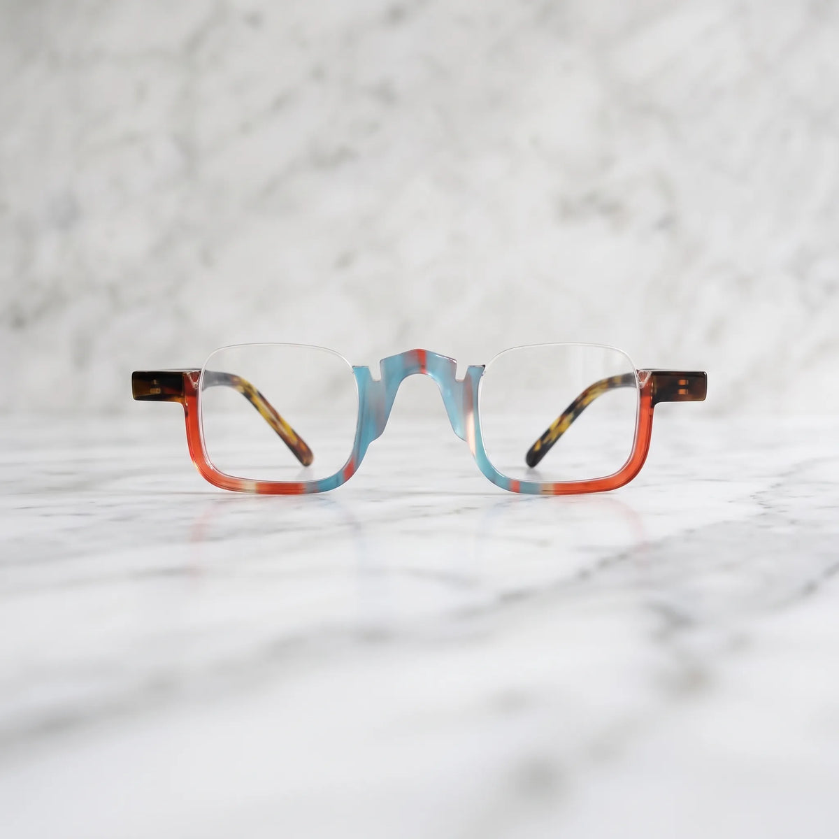 Front view of  VL19352 Crystal Blue Tortoise semi-rimless square eyeglasses featuring colorful acetate details and a modern prescription-ready optical frame