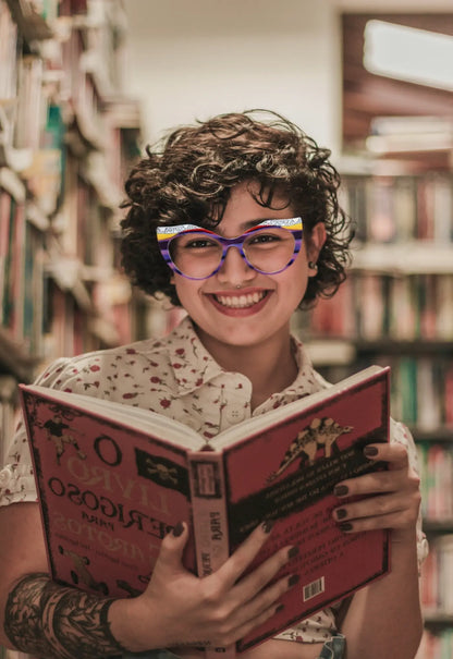 Model Wearing View of VoyueLens Amethyst Sunrise cat-eye eyeglasses with purple-to-yellow gradient and signature lace-pattern design.