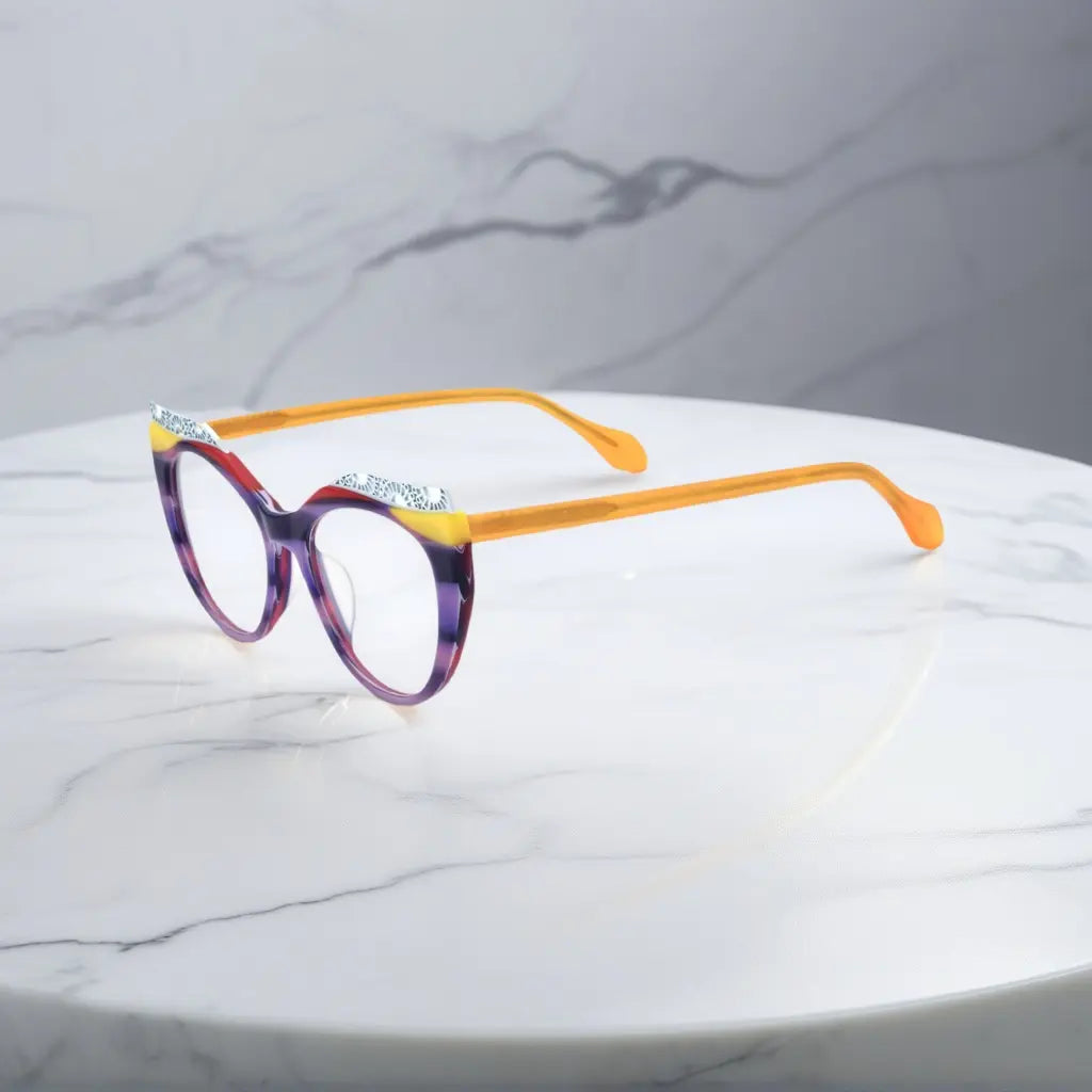 Side View of VoyueLens Amethyst Sunrise cat-eye eyeglasses with purple-to-yellow gradient and signature lace-pattern design.