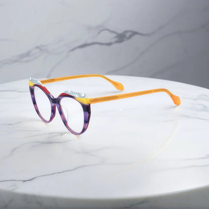 Side View of VoyueLens Amethyst Sunrise cat-eye eyeglasses with purple-to-yellow gradient and signature lace-pattern design.