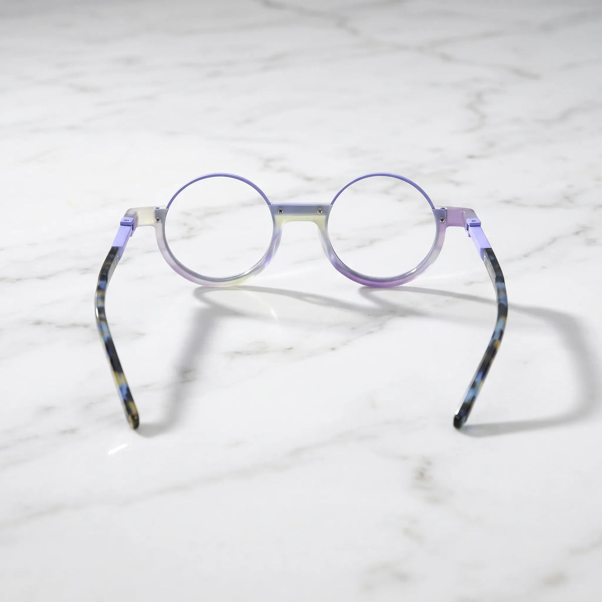 Back angle showing the high-transparency purple hue and layered frame design of Aurora Fade eyeglasses.