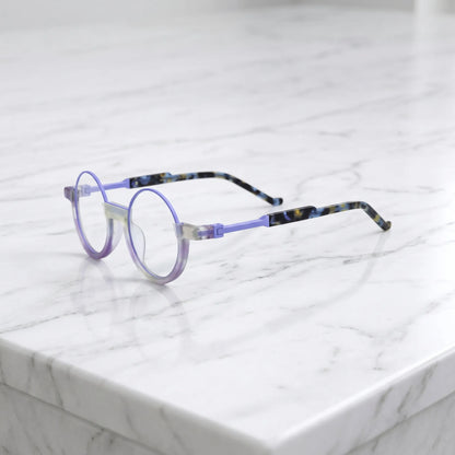 Side view highlighting the purple acetate frame and slender arms of Aurora Fade round eyeglasses by VoyueLens.