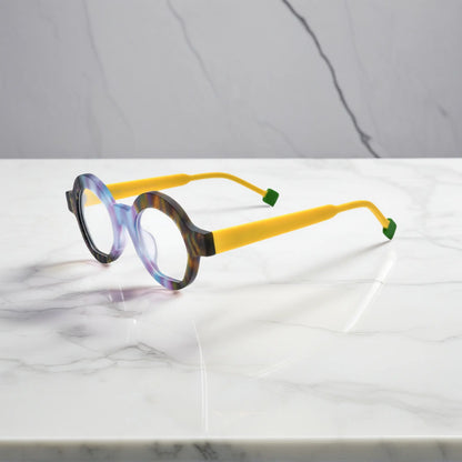 Side view of Aurora Fade frame with soft yellow matte temples, artistic design and ultra-lightweight acetate