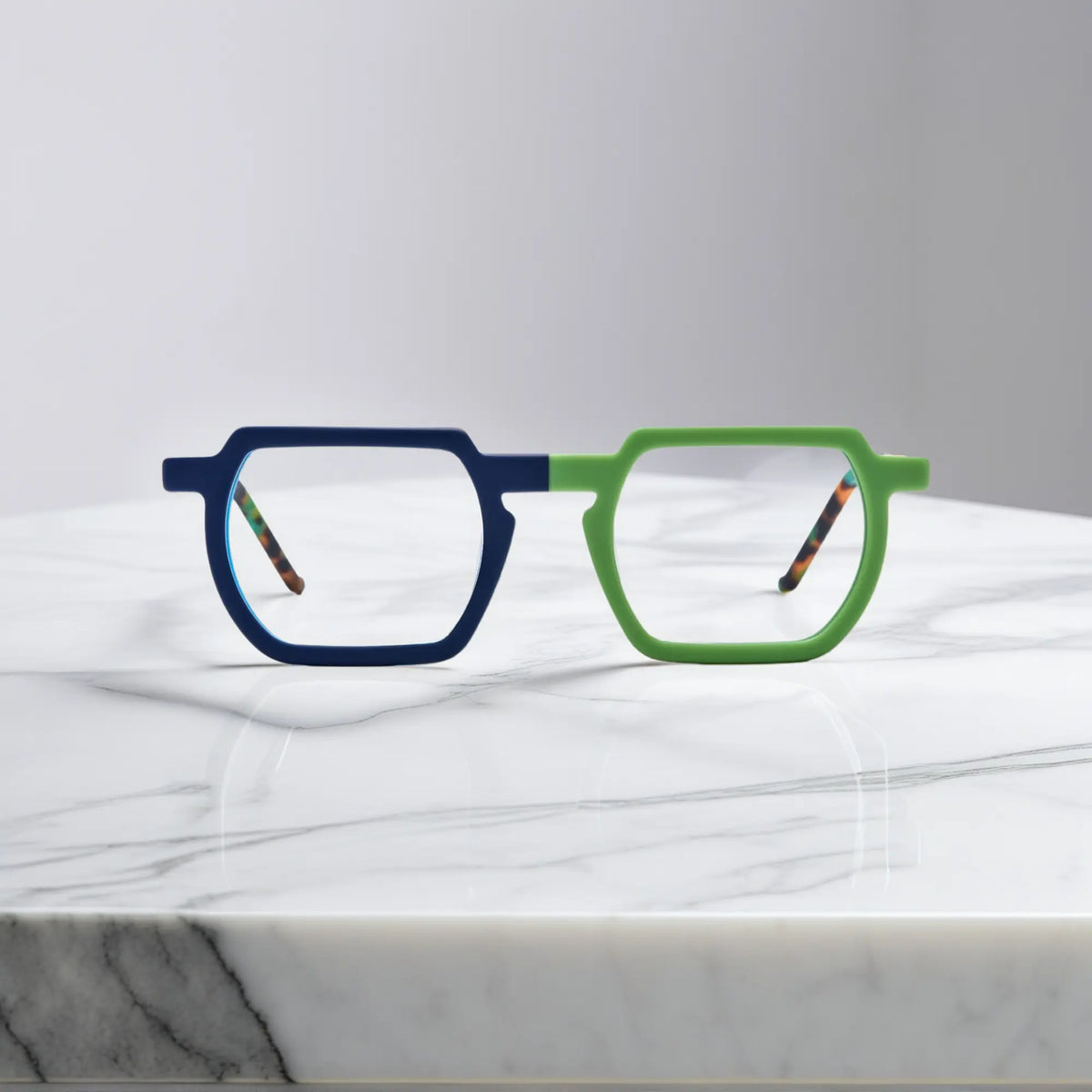 Front view of VoyueLens Blue-Green Matte eyeglasses with square frame, bold contrast, and a modern streetwear vibe