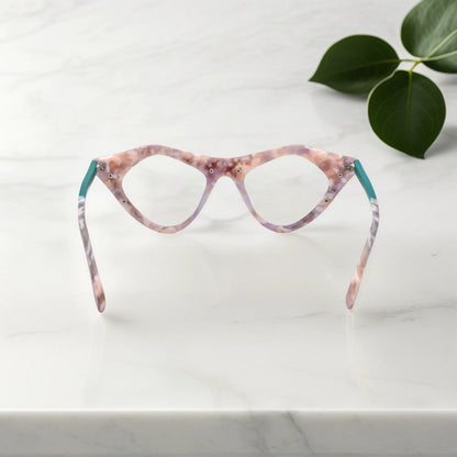 Rear view of Blush Marble VoyueLens pixel cat-eye glasses with marbled pastel texture