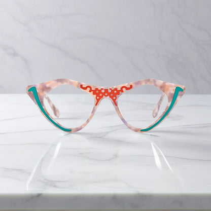 Blush Marble VoyueLens pixel cat-eye glasses front view with soft pink marble pattern
