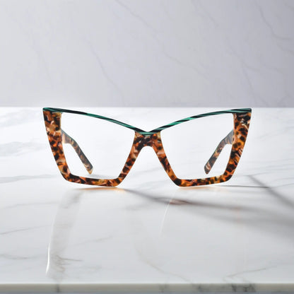VoyueLens oversized cat-eye glasses in emerald tortoise, front view showing green inner rim and butterfly-shaped full-rim acetate frame for women