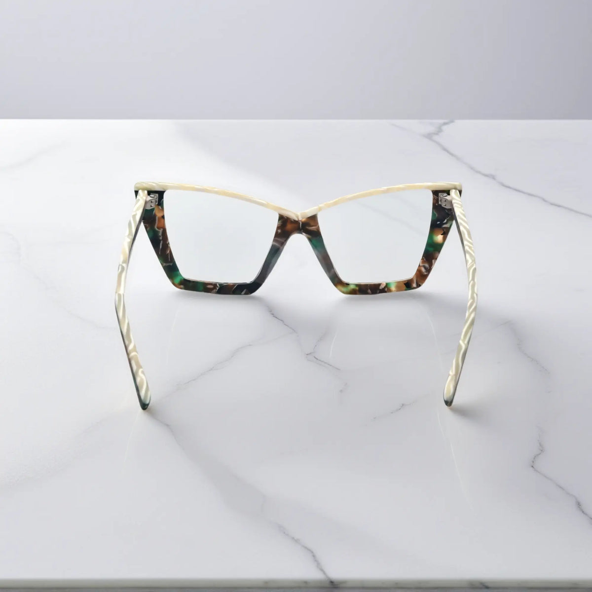 Rear angle of Olive Tortoise variant of VoyueLens cat-eye glasses, showing interior pattern and temple construction