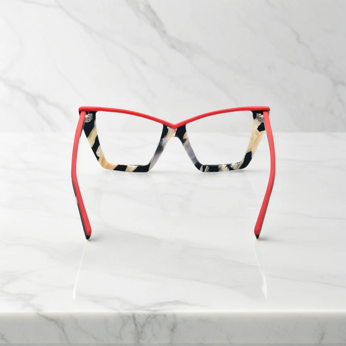 Back view of VoyueLens Scarlet Ivory Feather cat-eye frames, showing temple curvature and vibrant acetate finish