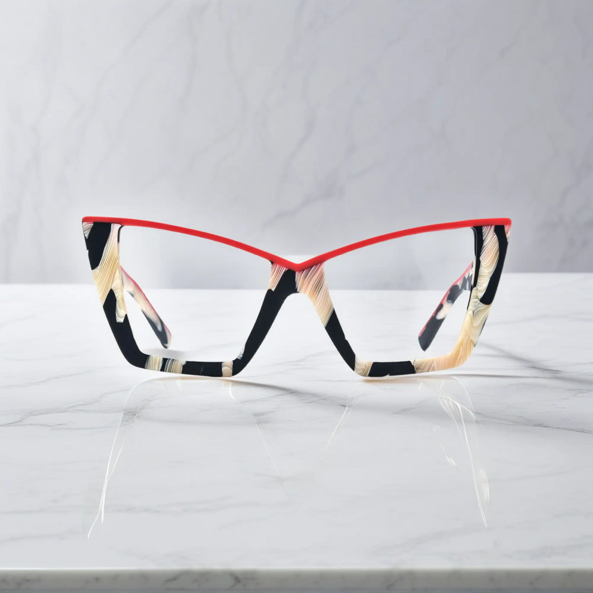 Front view of VoyueLens cat-eye glasses in Scarlet Ivory Feather colorway, featuring red-accented top rim and ivory feathered acetate texture