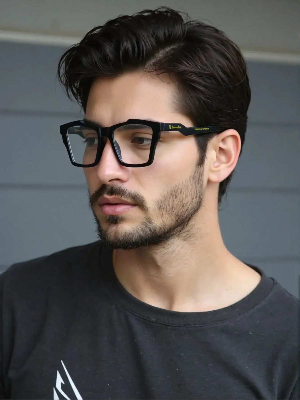 Model wearing VoyueLens Charcoal Black butterfly frame in solid matte black with subtle gray temples, demonstrating stylish fit for wide faces.