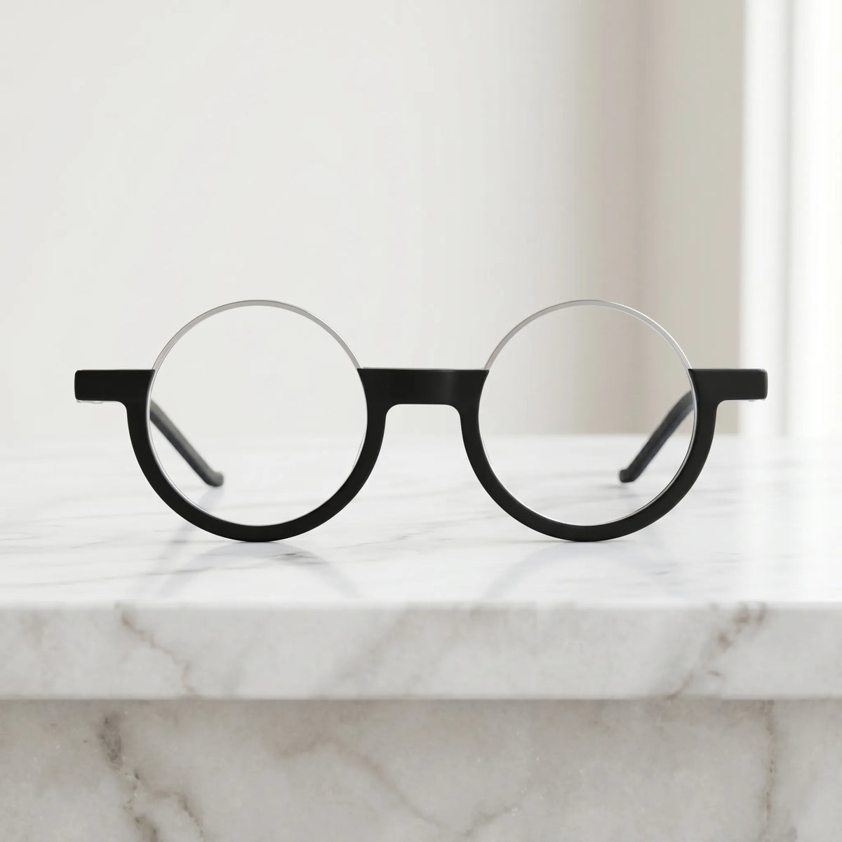 Front view of VoyueLens Charcoal Silver eyeglasses featuring a sleek matte black frame and minimalist silver detail.