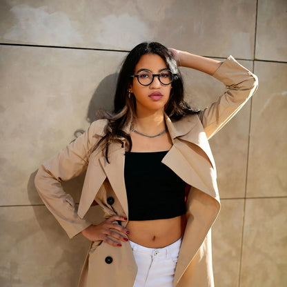 Model wearing sleek Charcoal Silver VoyueLens eyeglasses with understated elegance and modern appeal.