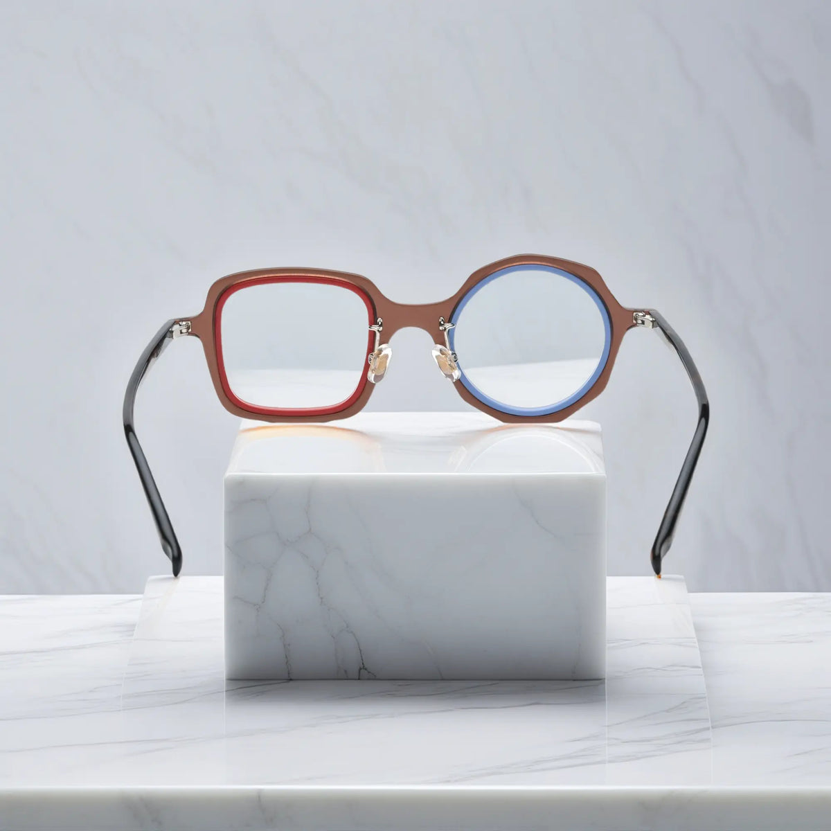VoyueLens geometric eyeglasses in Chestnut Blue color, rear view highlighting acetate structure and temple tips.