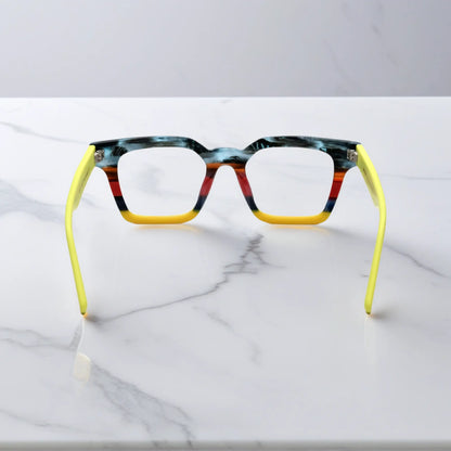 Back view of Citrus Fade eyeglasses with orange and yellow matte block pattern
