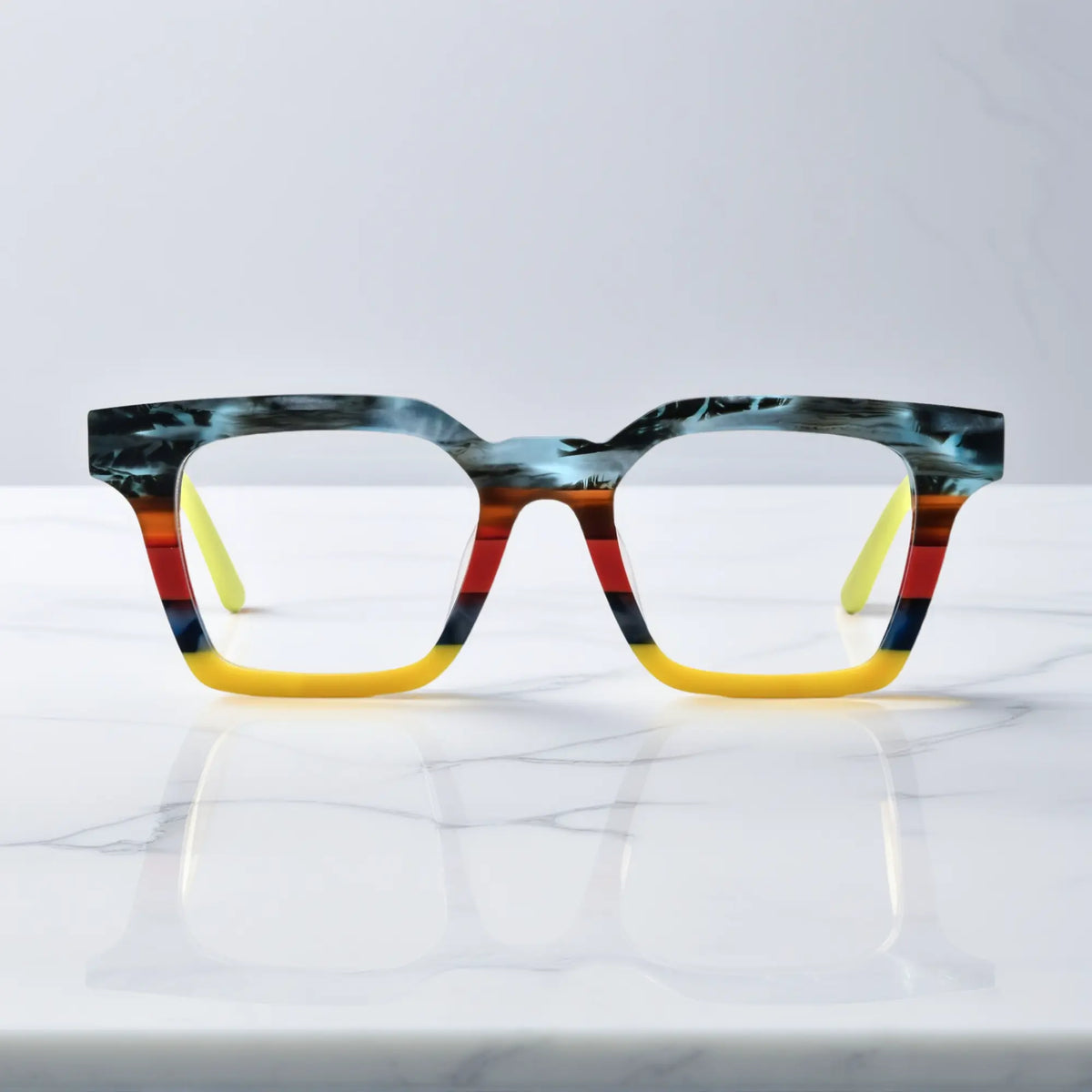 Front view of VoyueLens Citrus Fade eyeglasses with orange and yellow matte block pattern