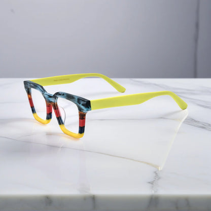 Side view of Citrus Fade eyeglasses with orange and yellow matte block pattern