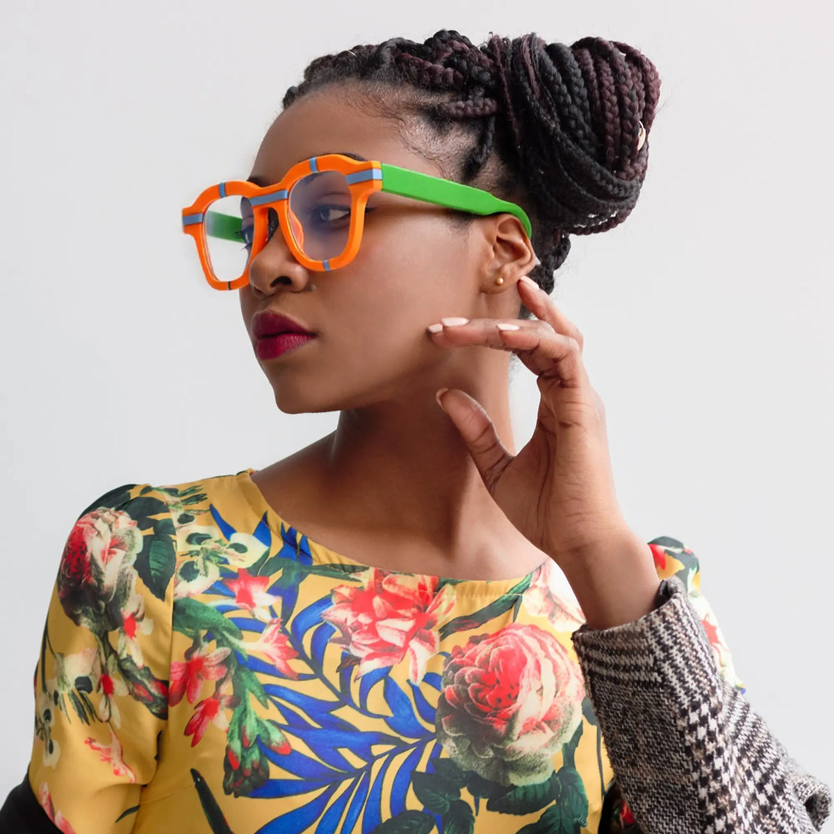 Fashion model showcasing the bold and colorful Citrus Pop eyeglasses by VoyueLens Urban Pop Series