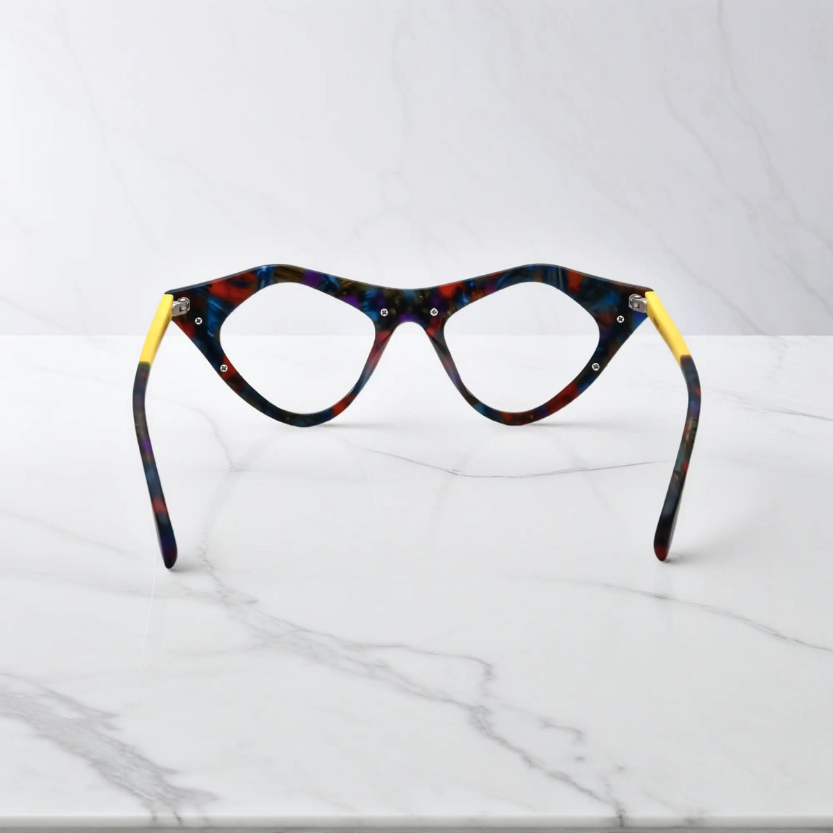 Rear view of Color Burst VoyueLens pixel cat-eye eyewear in matte rainbow acetate