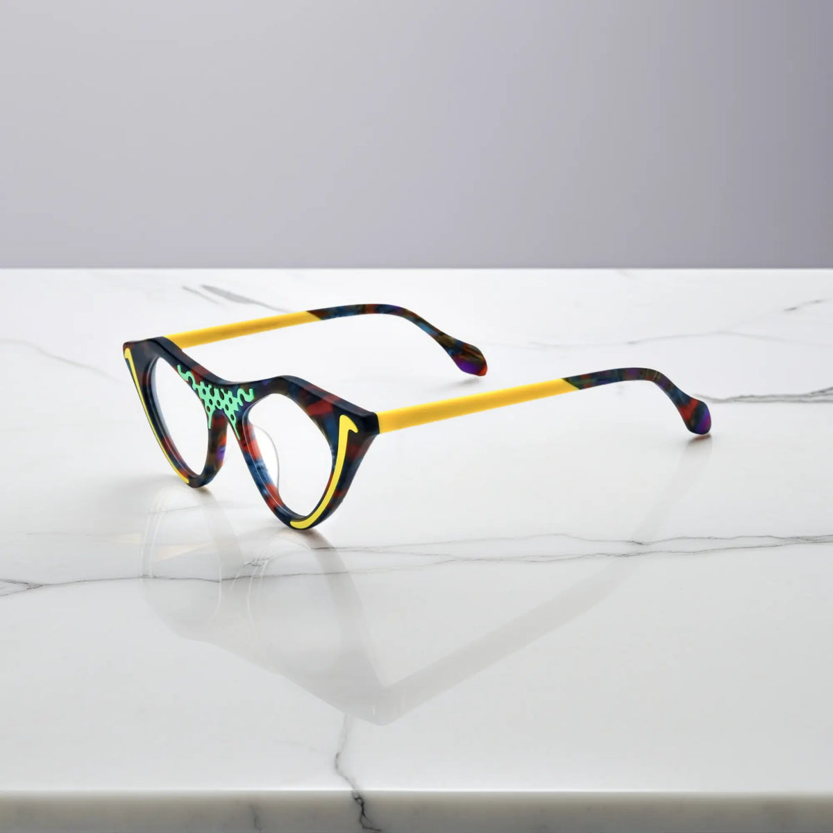 Color Burst VoyueLens pixel cat-eye glasses side profile with bold triangular structure