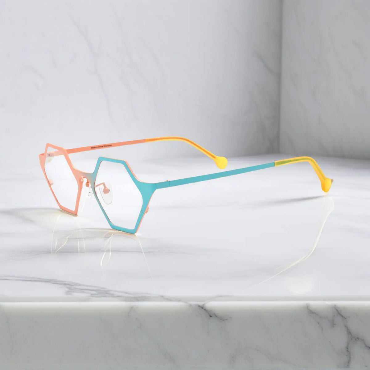 Side view of VoyueLens VL185881 in Coral Frost – pastel dual-tone titanium frame