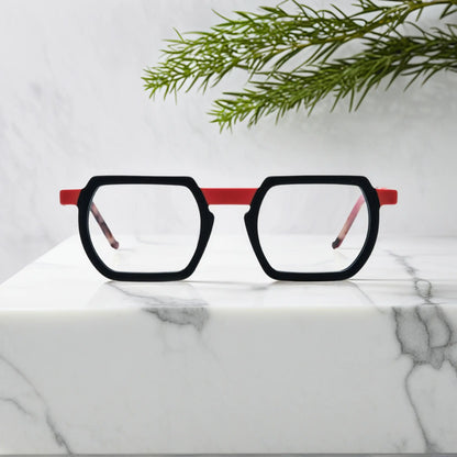 Front angle of VoyueLens Crimson Noir square frames in matte black with deep crimson accents