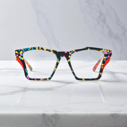 Front-facing view of VoyueLens Crystal Confetti butterfly eyeglass frame featuring translucent frosted acetate with pastel speckles, showcasing its signature matte butterfly design.