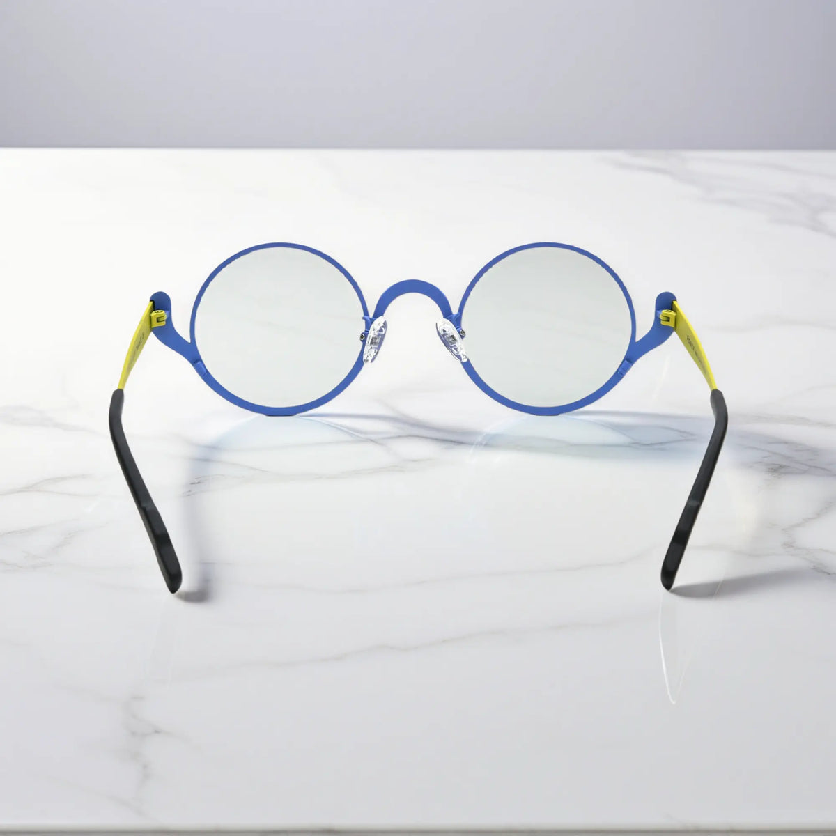 Back angle of VoyueLens Electric Rust frames – rounded design with extended arms