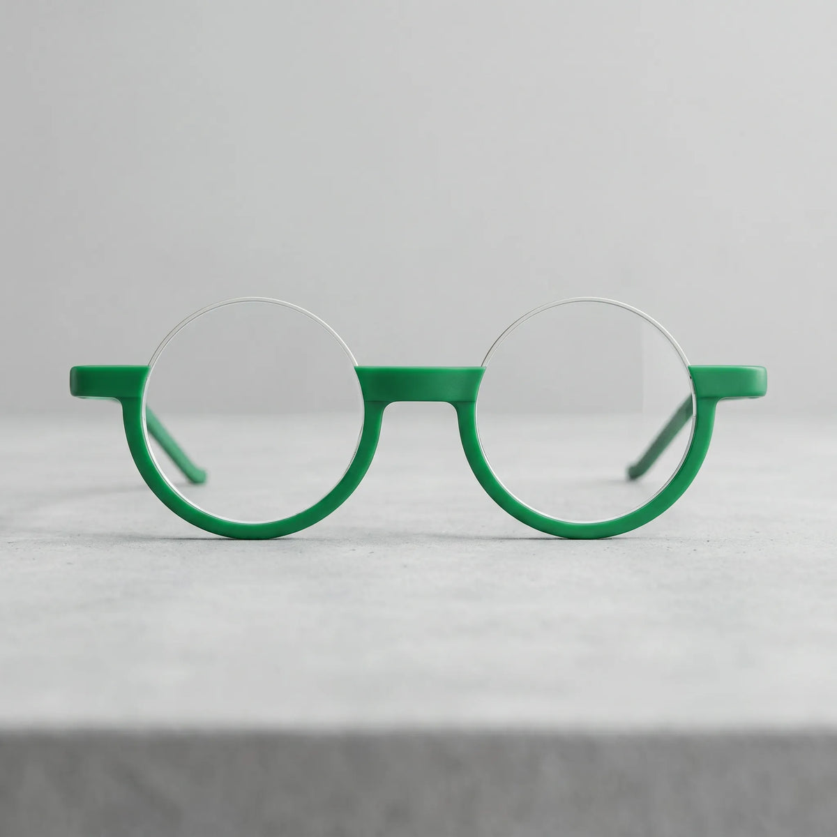Front view of Emerald Ice VoyueLens eyeglasses featuring frosted green-white tones in elegant round styling.