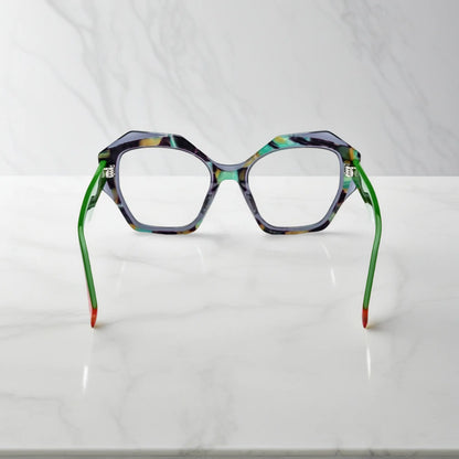 Rear view highlighting color-blocked orange tips and lightweight spring hinge construction.