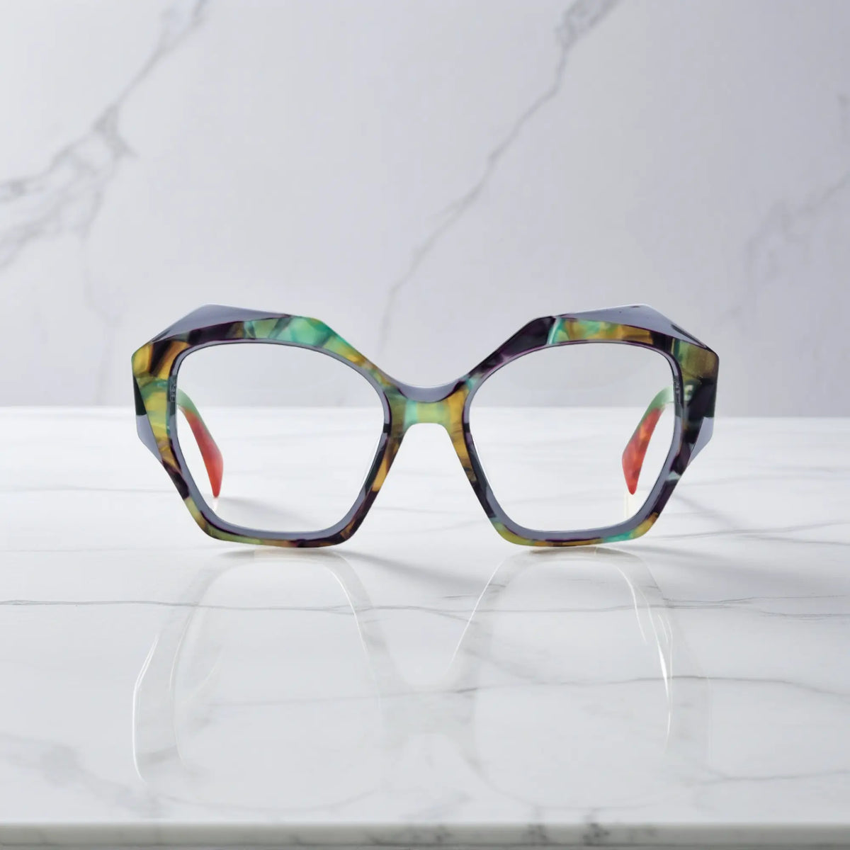Front view of VoyueLens Forest Marble eyeglasses featuring a polygonal frame and rich green-acetate color blend.