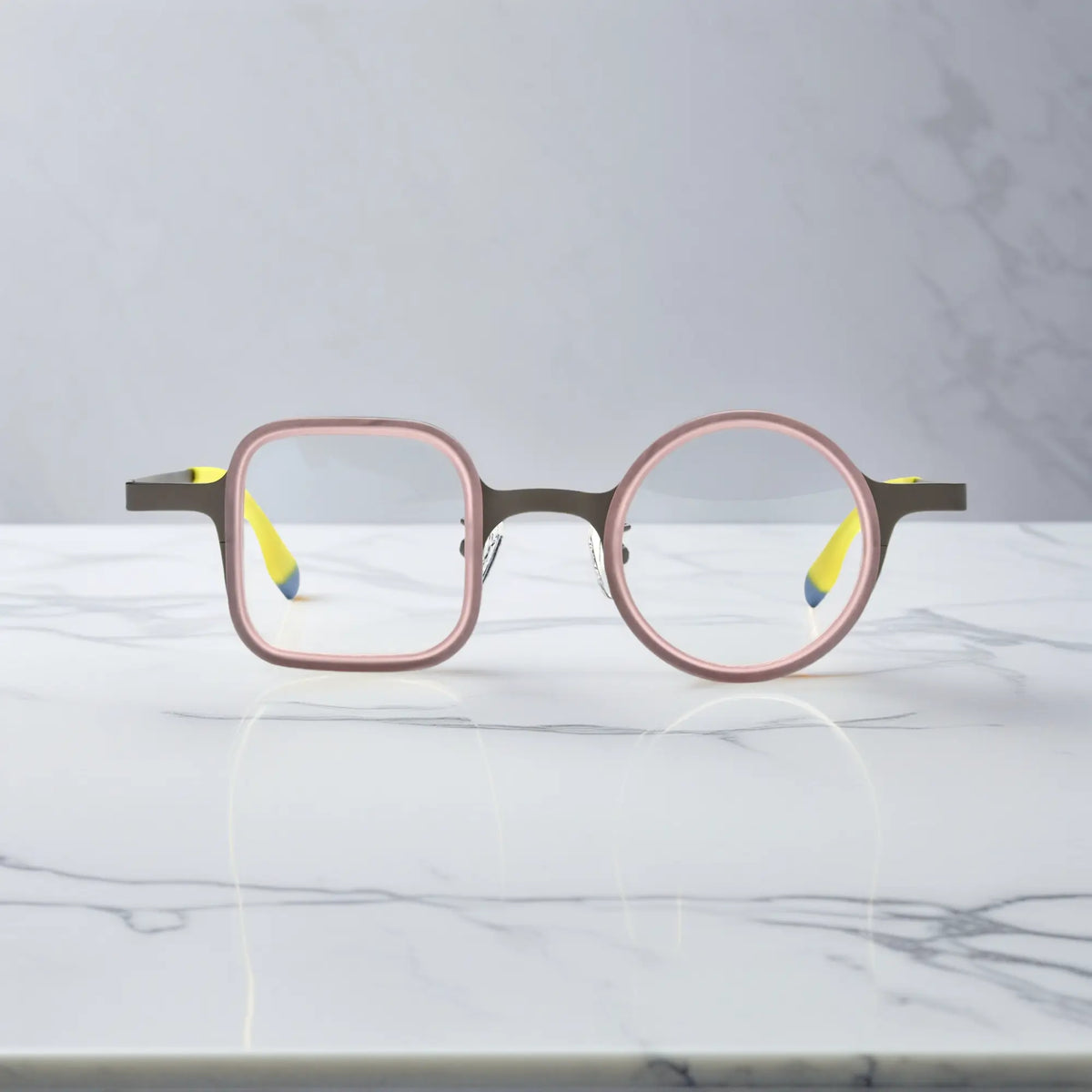 Front shot of Graphite Blush eyeglasses with stylish square-round hybrid lens shape.