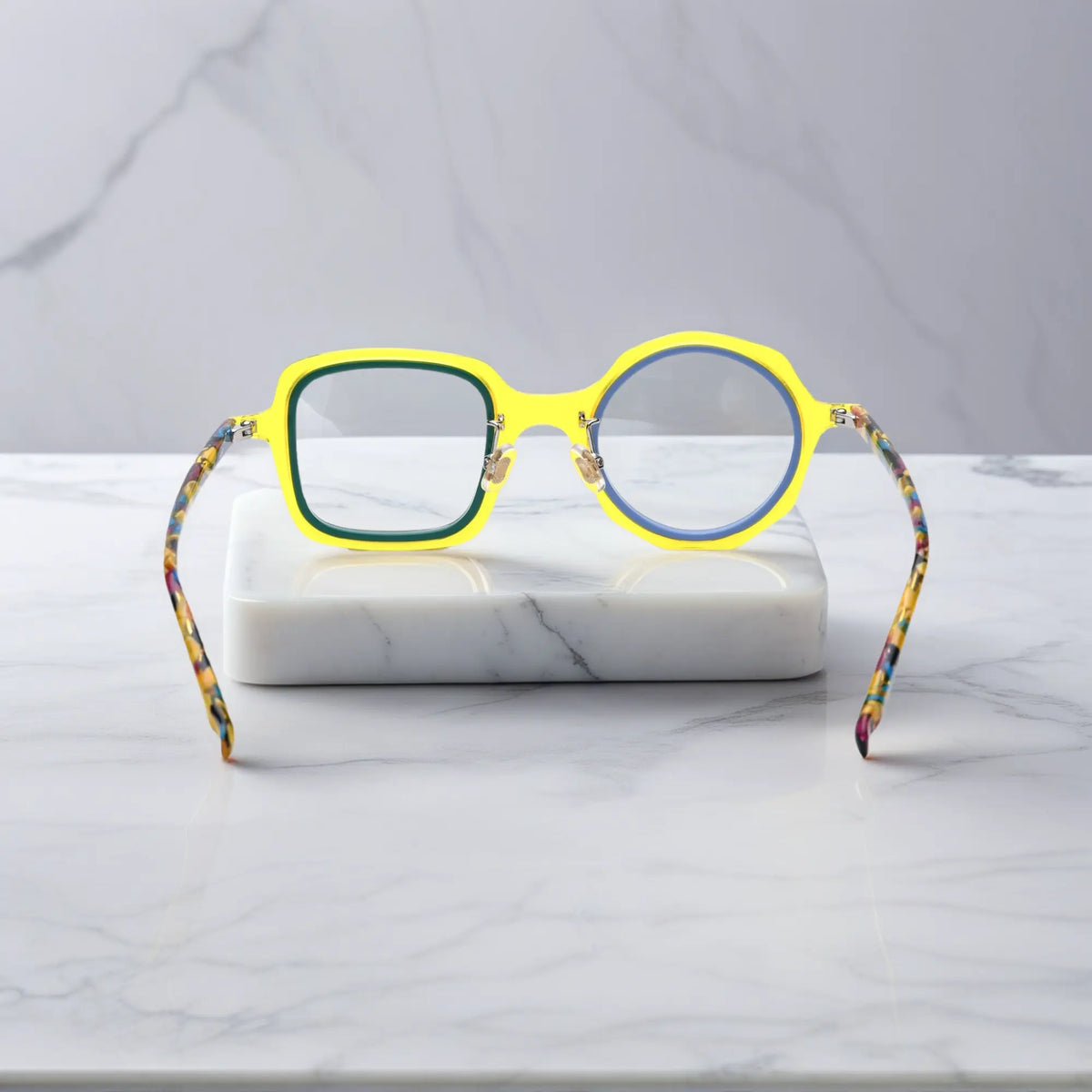 VoyueLens geometric eyeglasses in Honey Mint color, rear view highlighting acetate structure and temple tips.