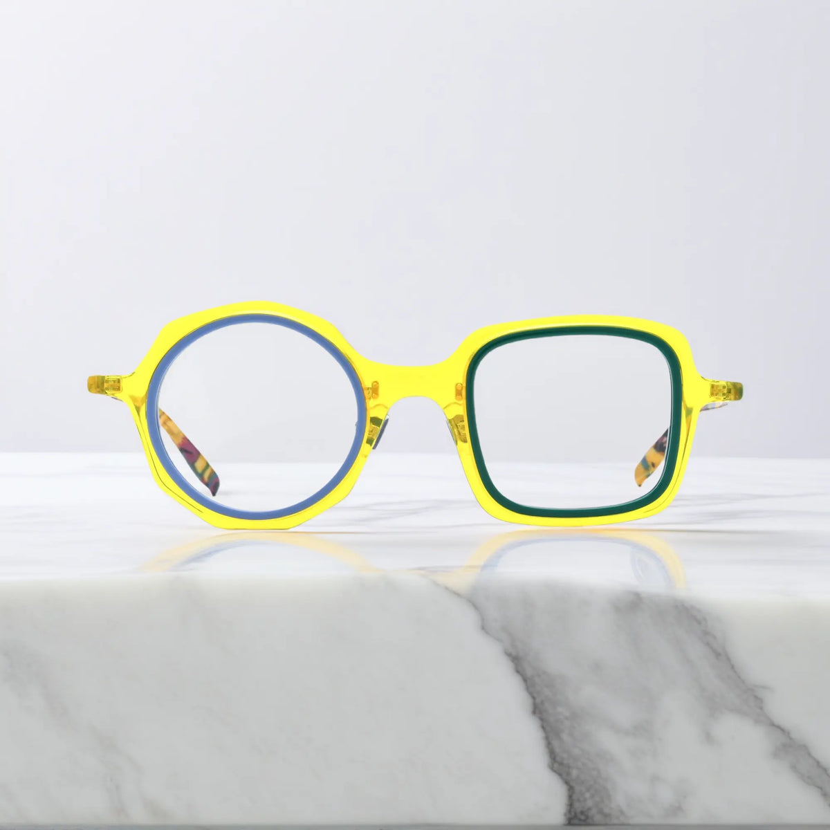 VoyueLens geometric eyeglasses in Honey Mint color, shown in front view. Features acetate frame and silicone nose pads.