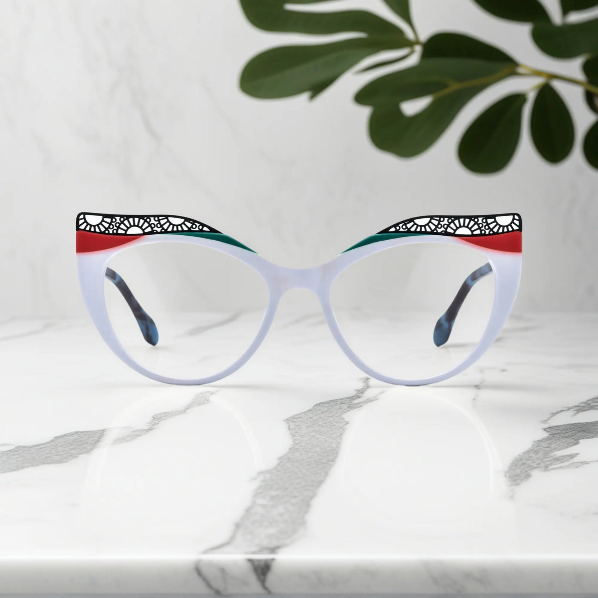 Front View of VoyueLens Ice Coral cat-eye eyeglasses with frosty white-to-coral fade and signature lace-pattern design.