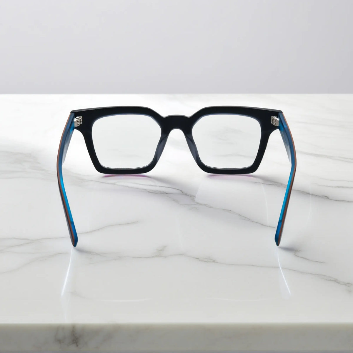 Back view of Indigo Mist eyeglasses with deep blue matte finish