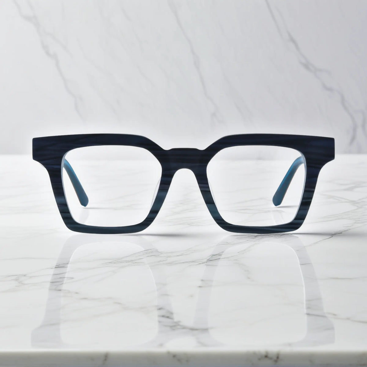 Front view of VoyueLens Indigo Mist eyeglasses with deep blue matte finish
