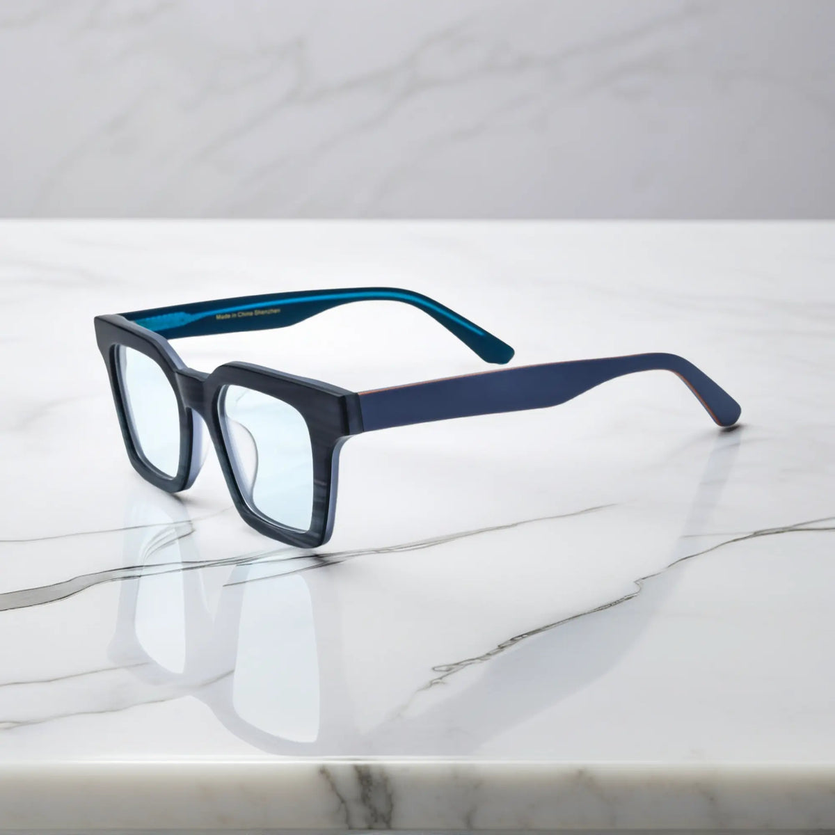 Side view of Indigo Mist eyeglasses with deep blue matte finish