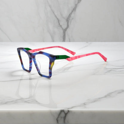 Side profile of VoyueLens Indigo Wave glasses, highlighting matte striped indigo with flowing tonal patterns and ergonomic acetate arms.