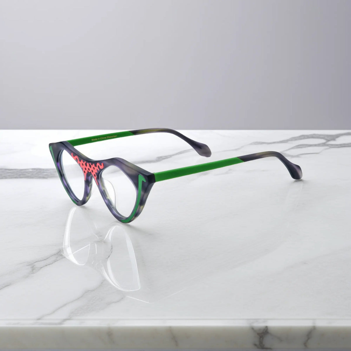 Jungle Moss VoyueLens pixel cat-eye glasses side view highlighting acetate-metal mix