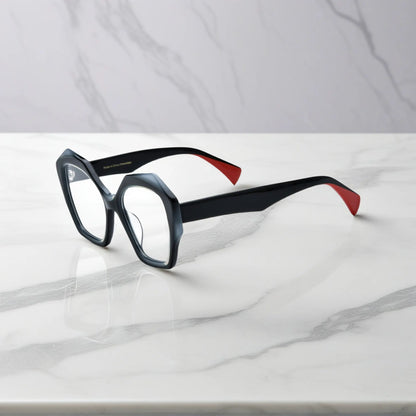 Side view displaying black acetate temples with red tips for a bold, modern twist.