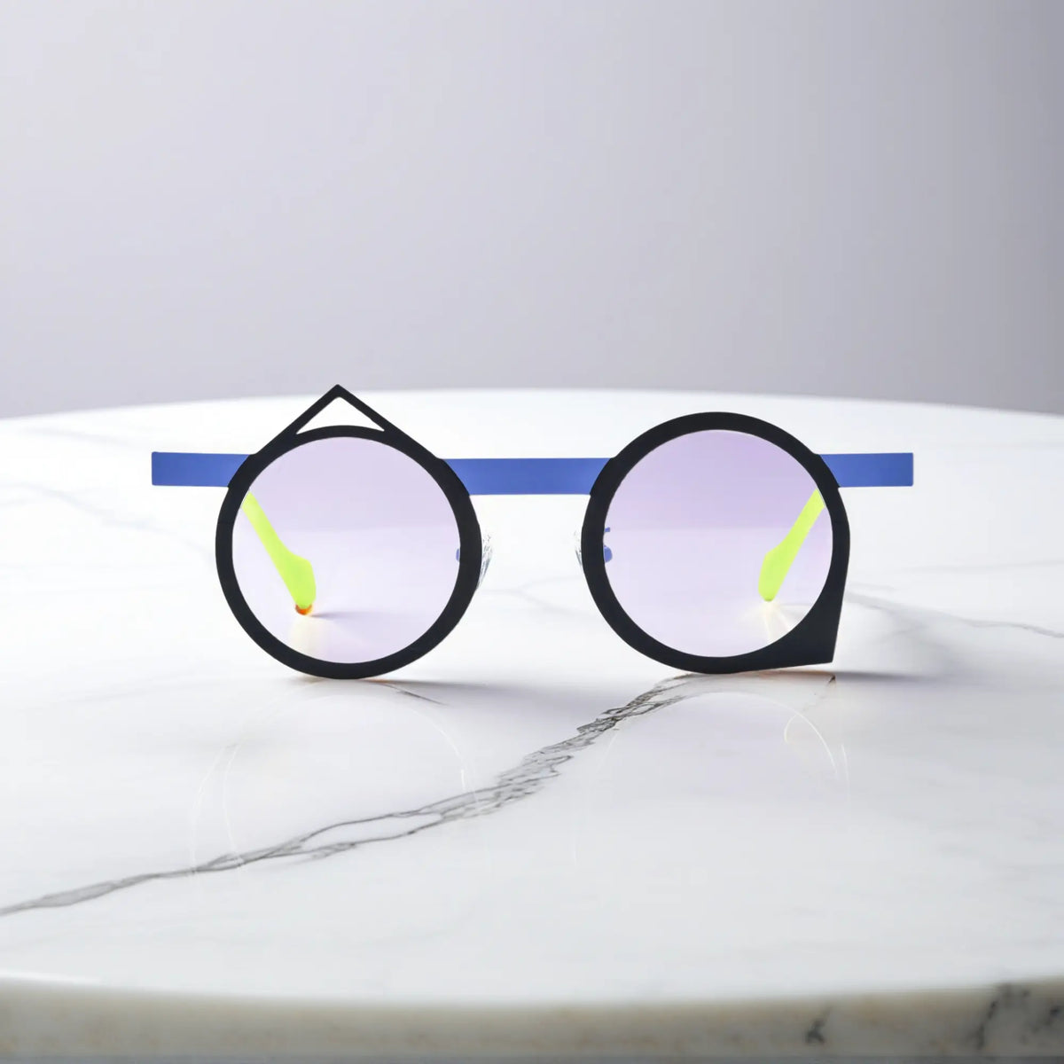 Front view of VoyueLens VL185801 Midnight Neon eyeglasses in sleek black and neon blue titanium geometric frame.
