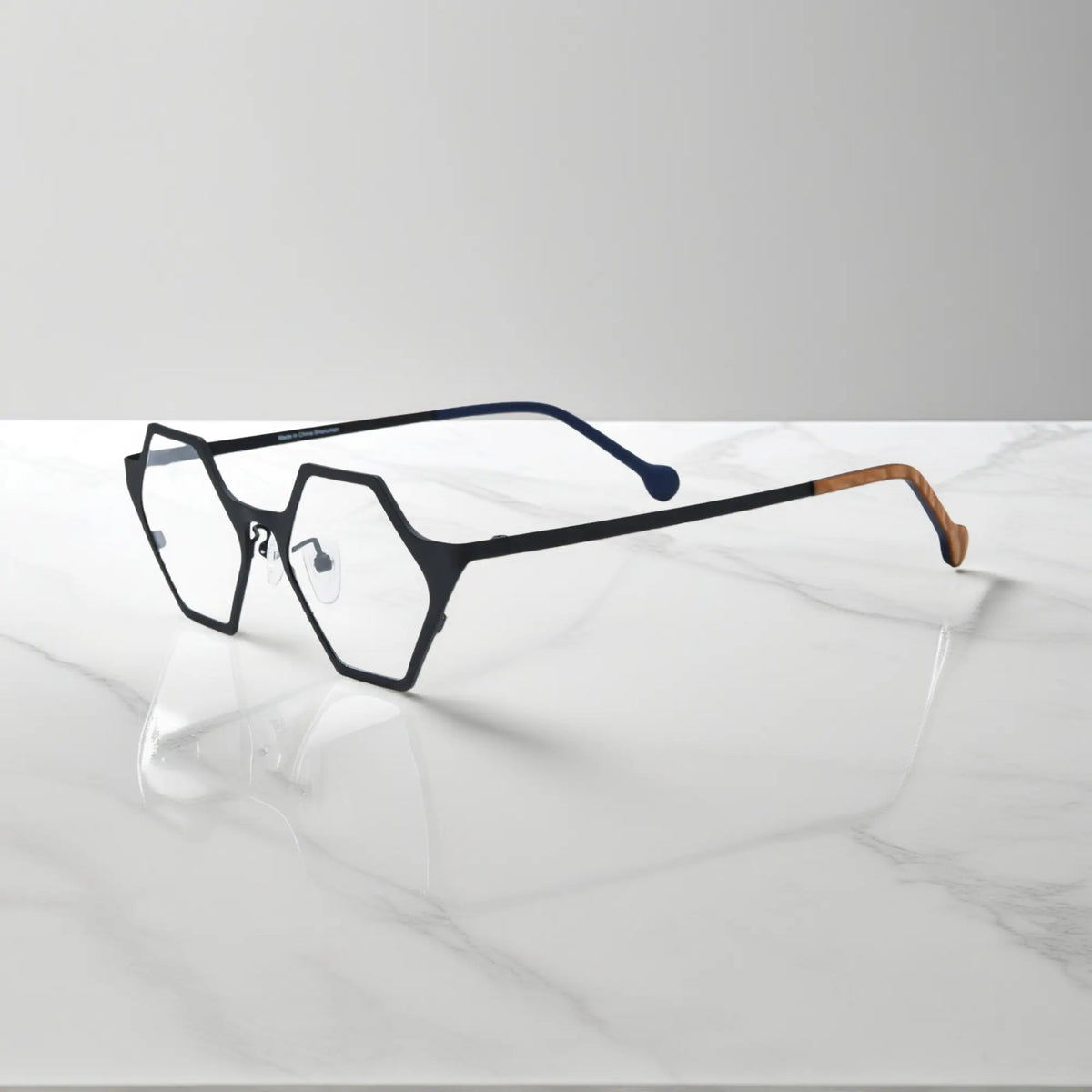 Side profile of VoyueLens VL185881 in Midnight Orbit – minimal black polygon frame