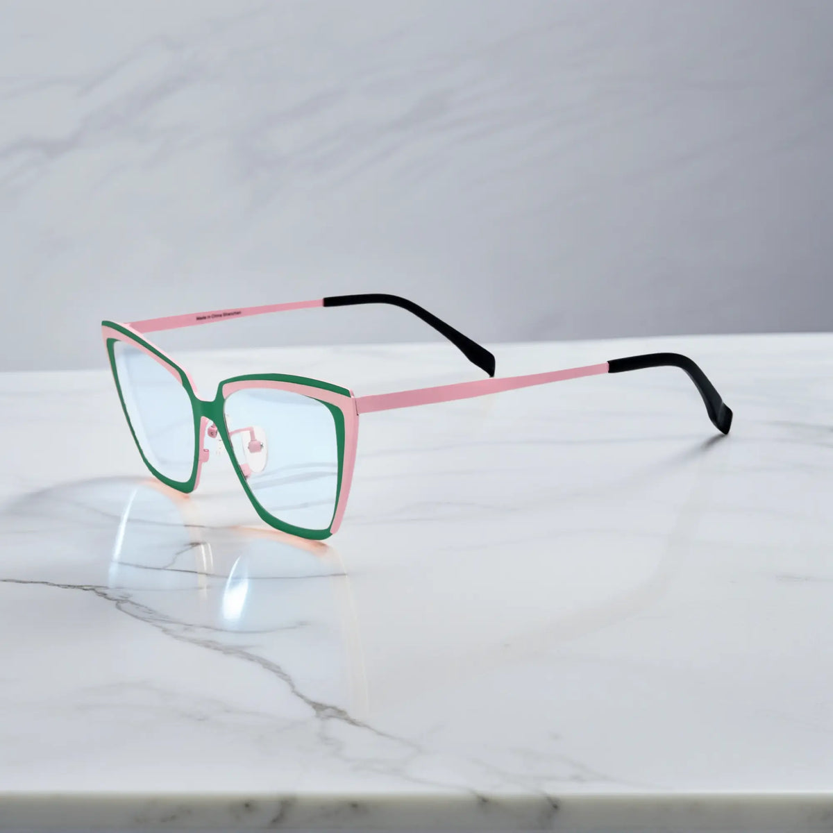 Side profile of green-pink VoyueLens VL185809 Mint Blush titanium glasses