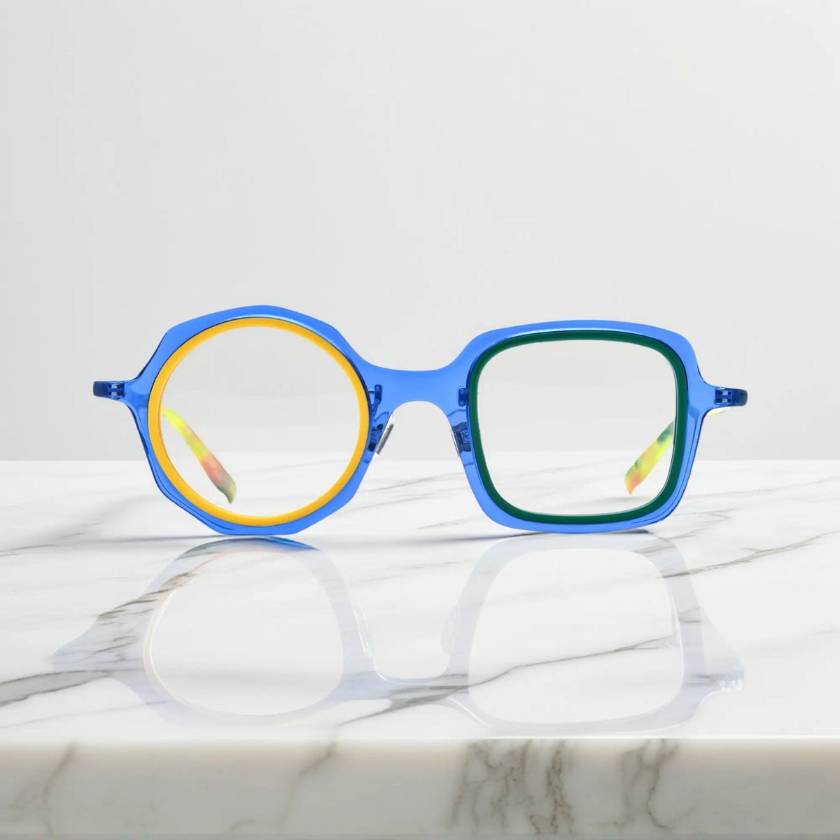 VoyueLens geometric eyeglasses in Navy Lemon color, shown in front view. Features acetate frame and silicone nose pads.