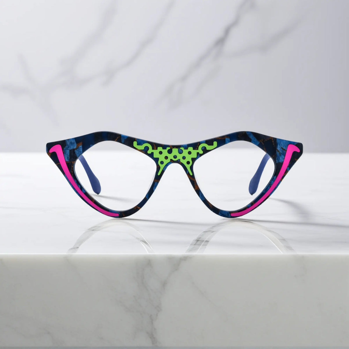 Neon Pop VoyueLens pixel cat-eye glasses front view with vibrant blue tones