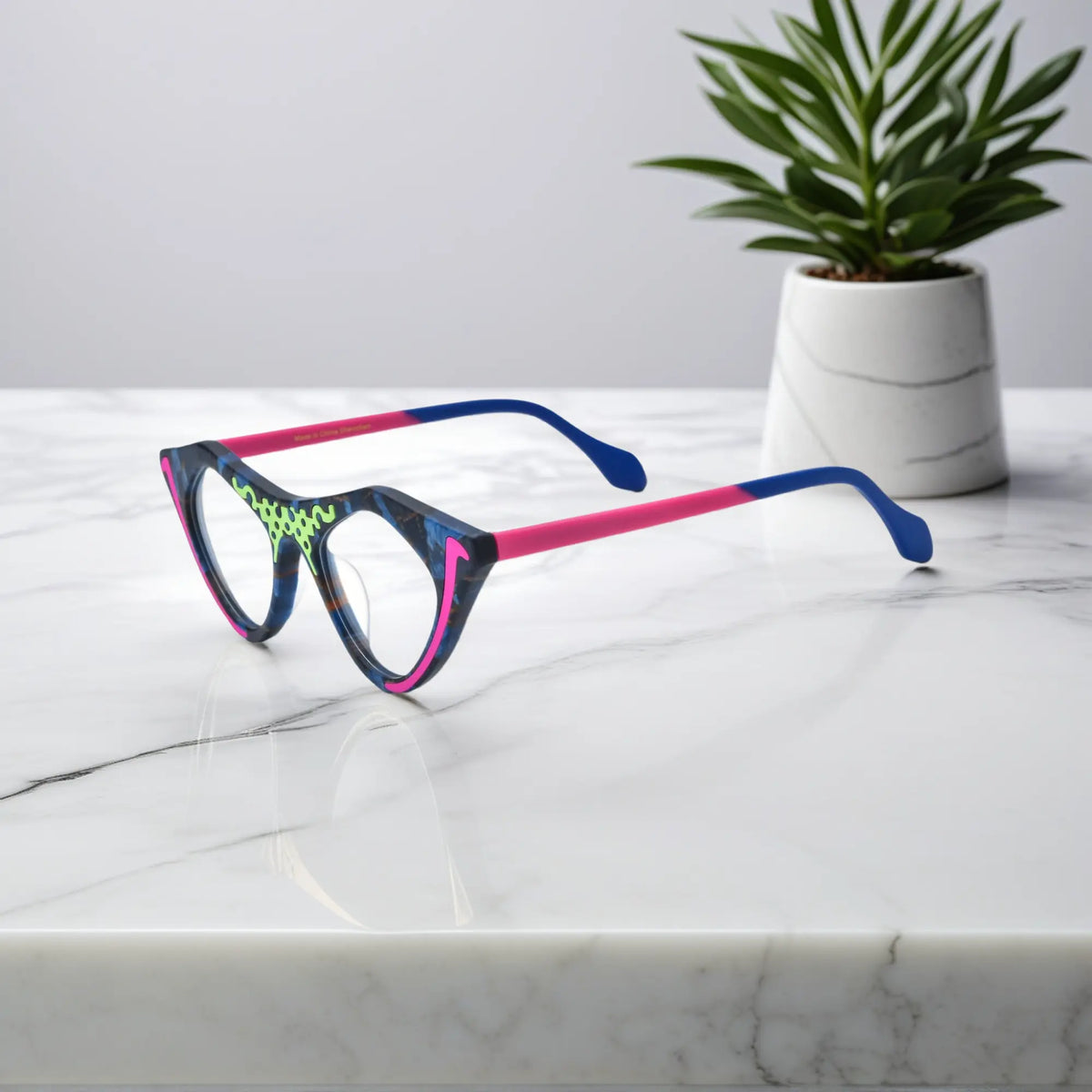Side view of Neon Pop VoyueLens pixel cat-eye glasses featuring electric matte design