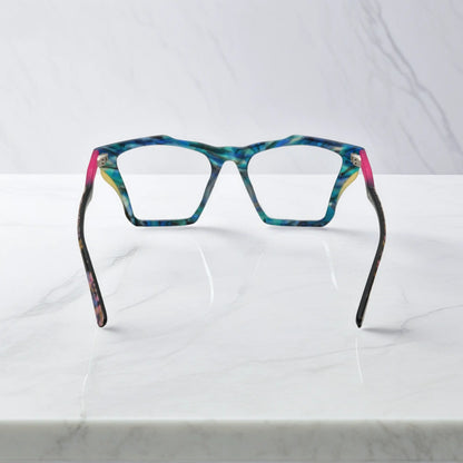 Rear view of VoyueLens Ocean Tortoiseshell frame, displaying matte teal and turquoise tortoiseshell finish from the inner frame and hinge area.