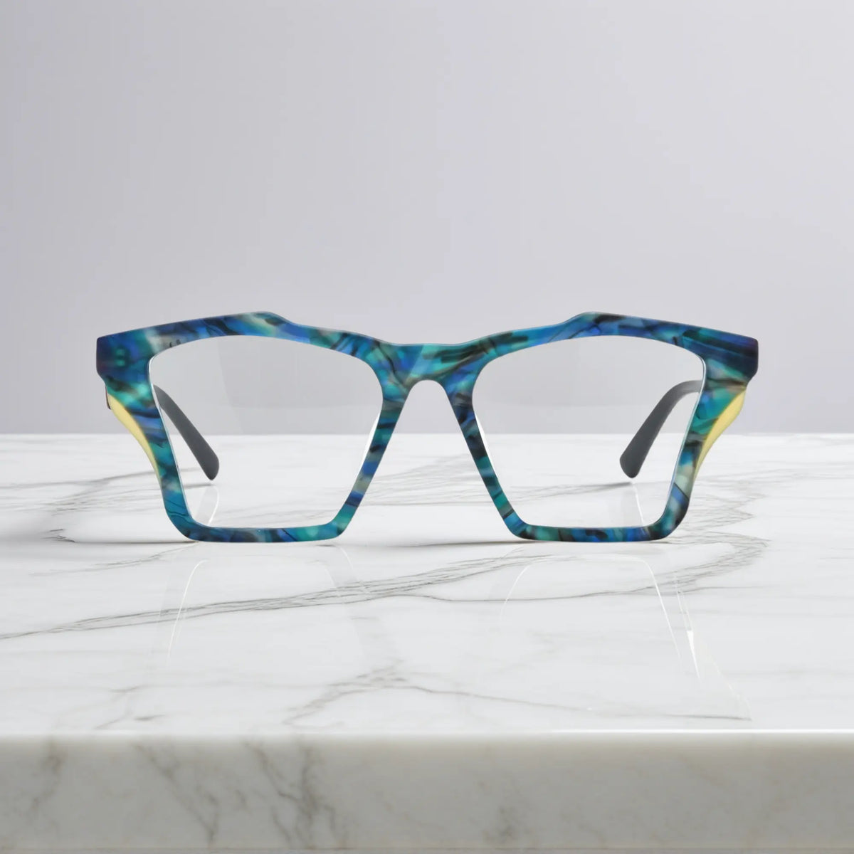 Front-facing view of VoyueLens Ocean Tortoiseshell butterfly eyeglass frame featuring matte teal and turquoise tortoiseshell finish, showcasing its signature matte butterfly design.