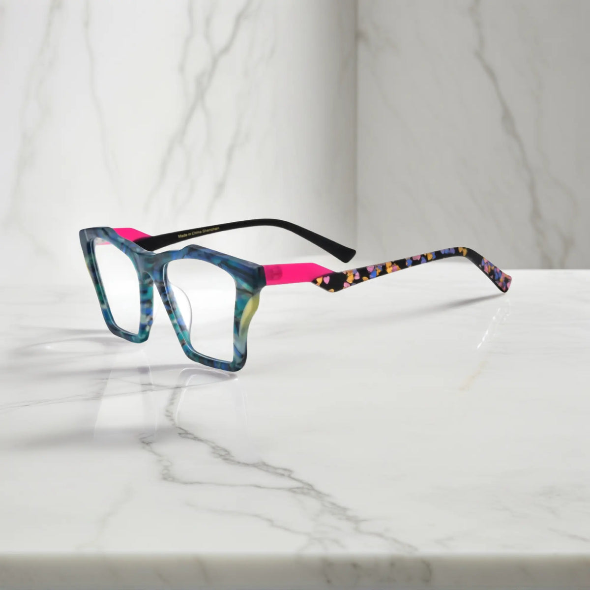Side profile of VoyueLens Ocean Tortoiseshell glasses, highlighting matte teal and turquoise tortoiseshell finish and ergonomic acetate arms.
